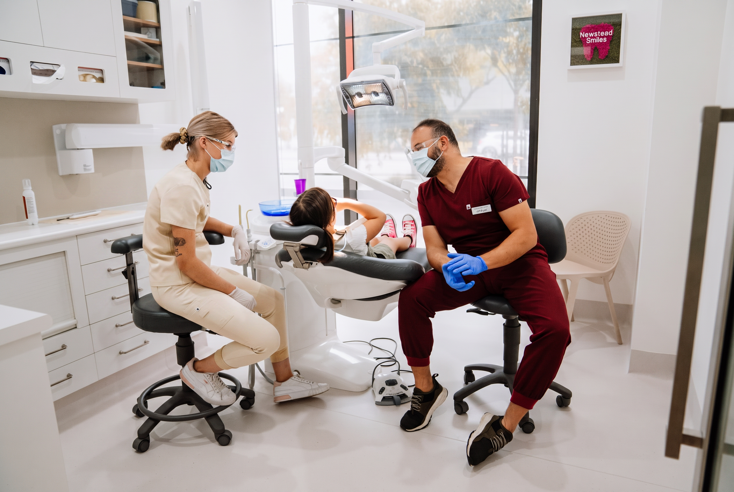 Newstead Smiles dental team caring for a patient in a modern Brisbane clinic room